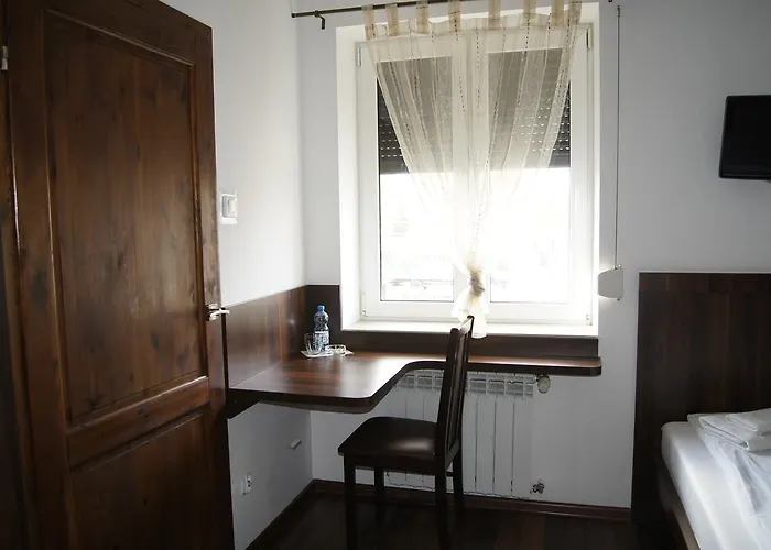 Quarto em Acomodações Particulares Uslugi Hotelowe A1